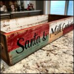 Close-up of a rustic wooden tray with 'Santa & Milk Cookies' painted on the side, perfect for a Santa's Milk and Cookies Tray DIY.