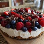 A beautiful dessert that always impresses, topped with fresh berries and chocolate.