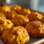 Close-up of freshly baked hypoallergenic cat treats on a baking sheet, ready to be enjoyed.