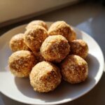 A plate of homemade No-Bake Cat Treat Balls, perfect for rewarding your feline friend.