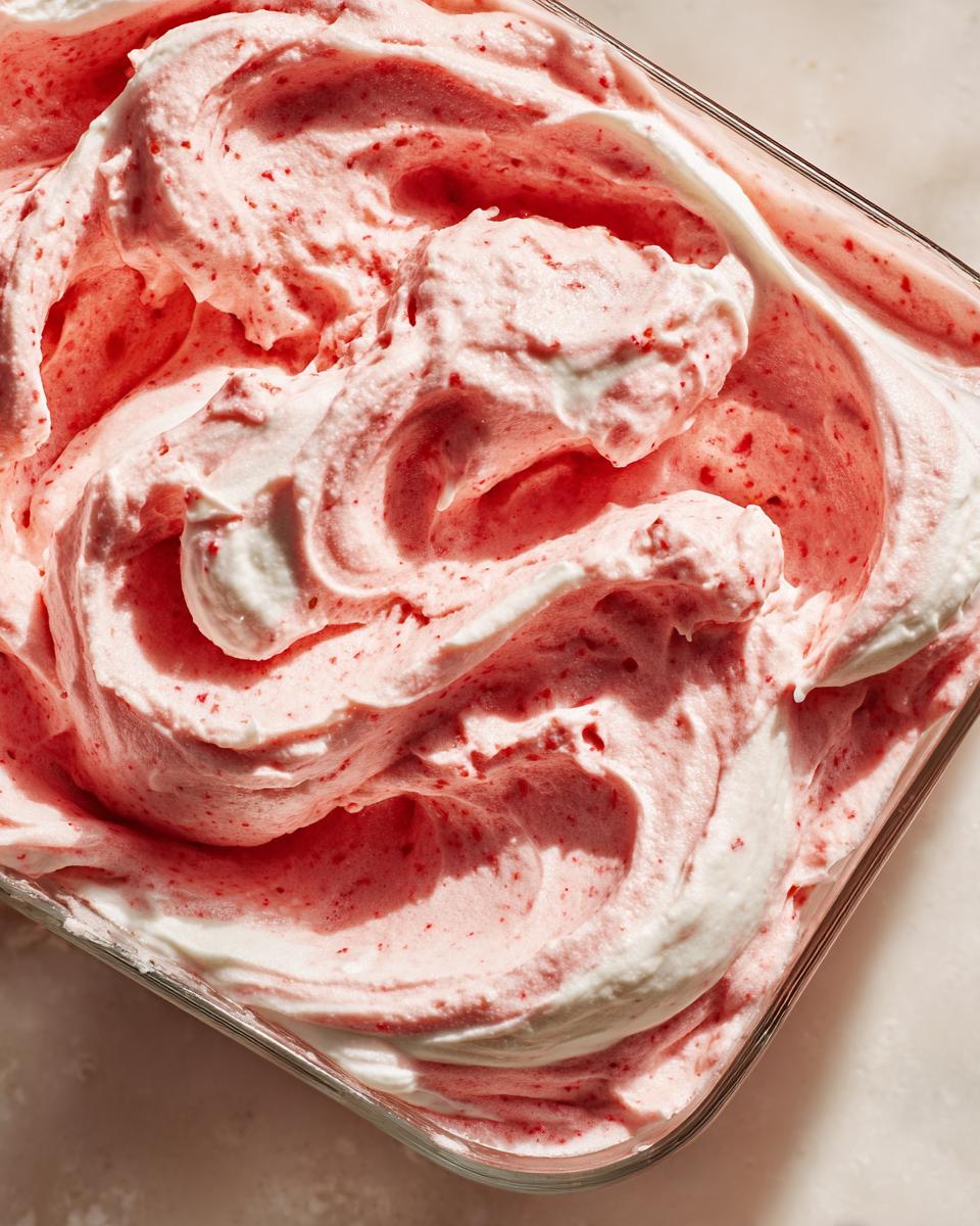 Close-up of a bowl of creamy Strawberry Fool, a delicious spring dessert.